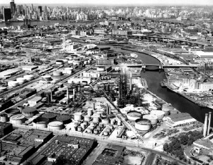 1960 aerial view of the Mobil refinery looking northwest from Apollo St & the Creek